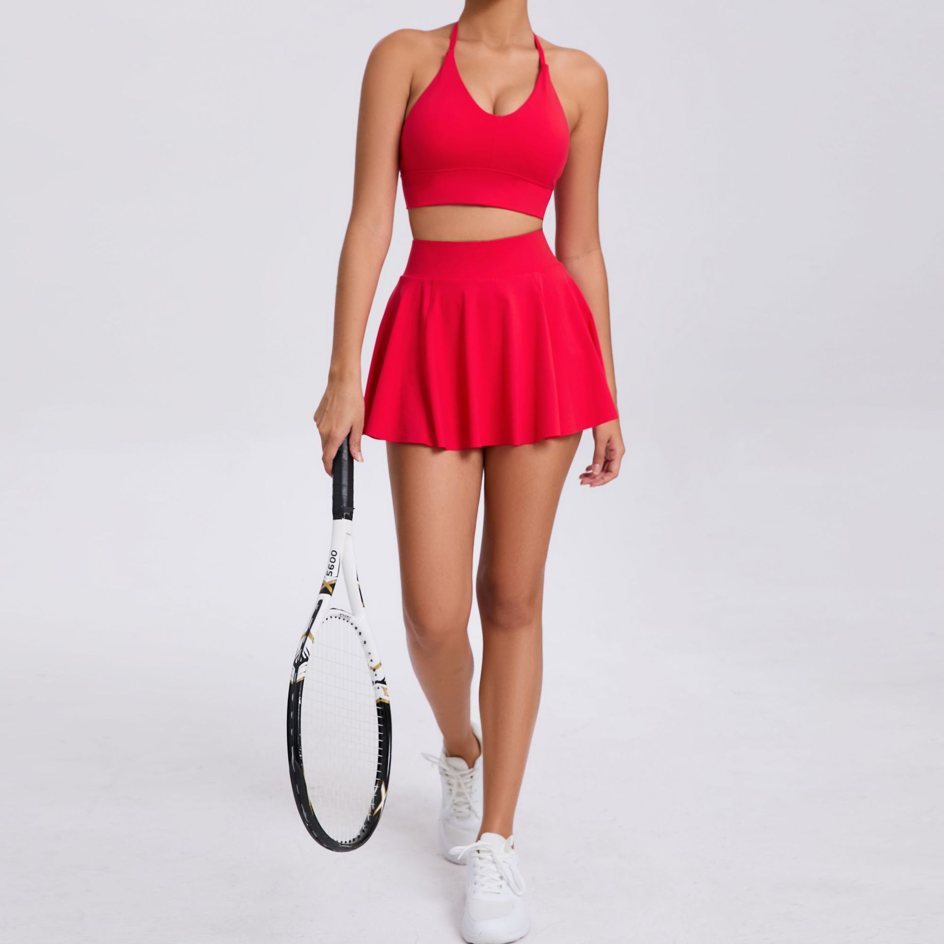 Conjunto deportivo casual de dos piezas: top tipo bra y falda, ideal para correr o jugar tenis, transpirable y cómodo.