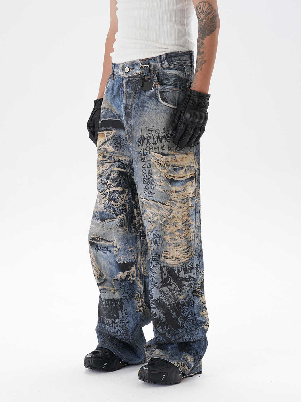 Jeans rectos rasgados con estampado graffiti 3D