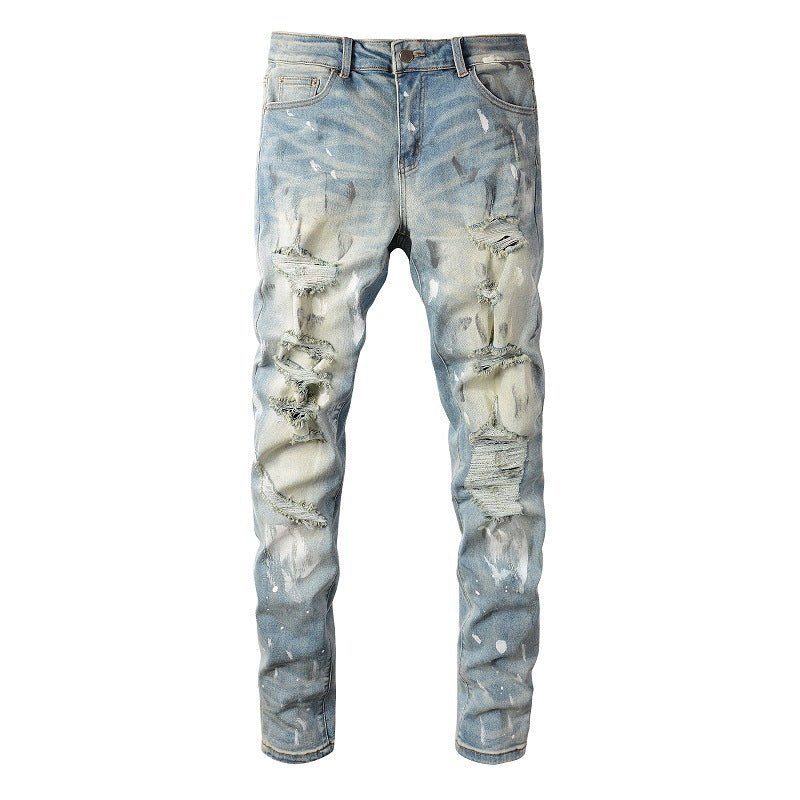Jeans vintage con agujeros y pintura para hombre