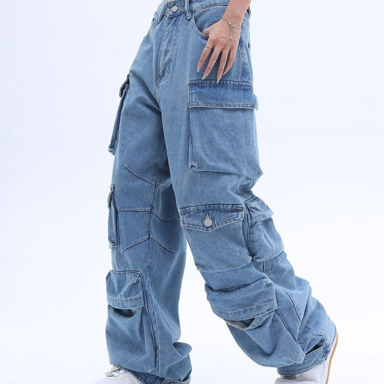 Jeans holgados estilo americano de calle alta con múltiples bolsillos y lavado desgastado.