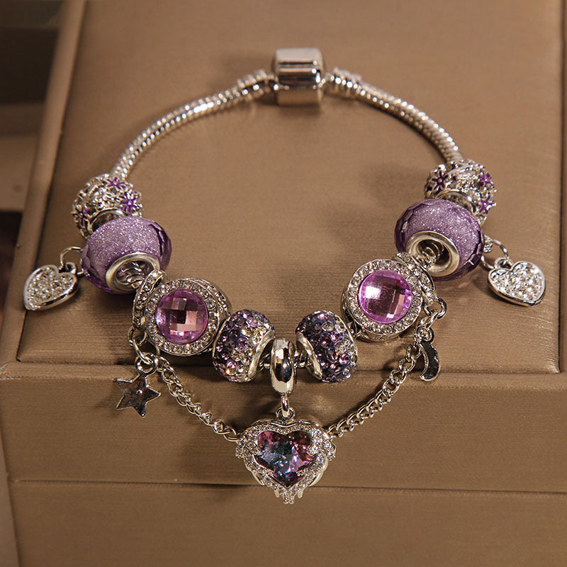 Pulsera Lujosa con Cuentas de Cristal Morado y Dije de Corazón