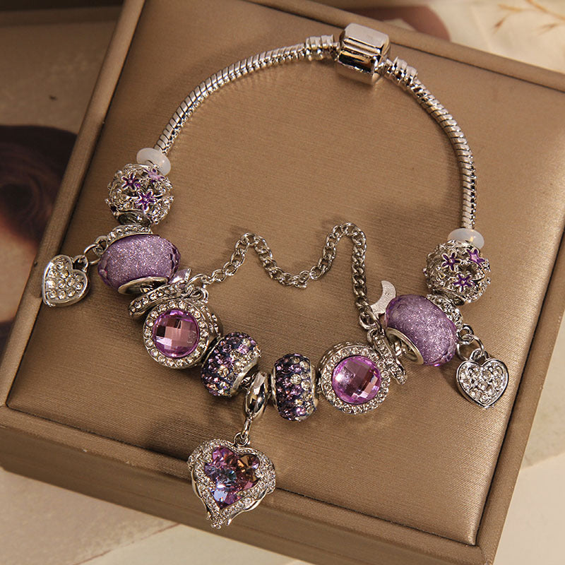 Pulsera Lujosa con Cuentas de Cristal Morado y Dije de Corazón
