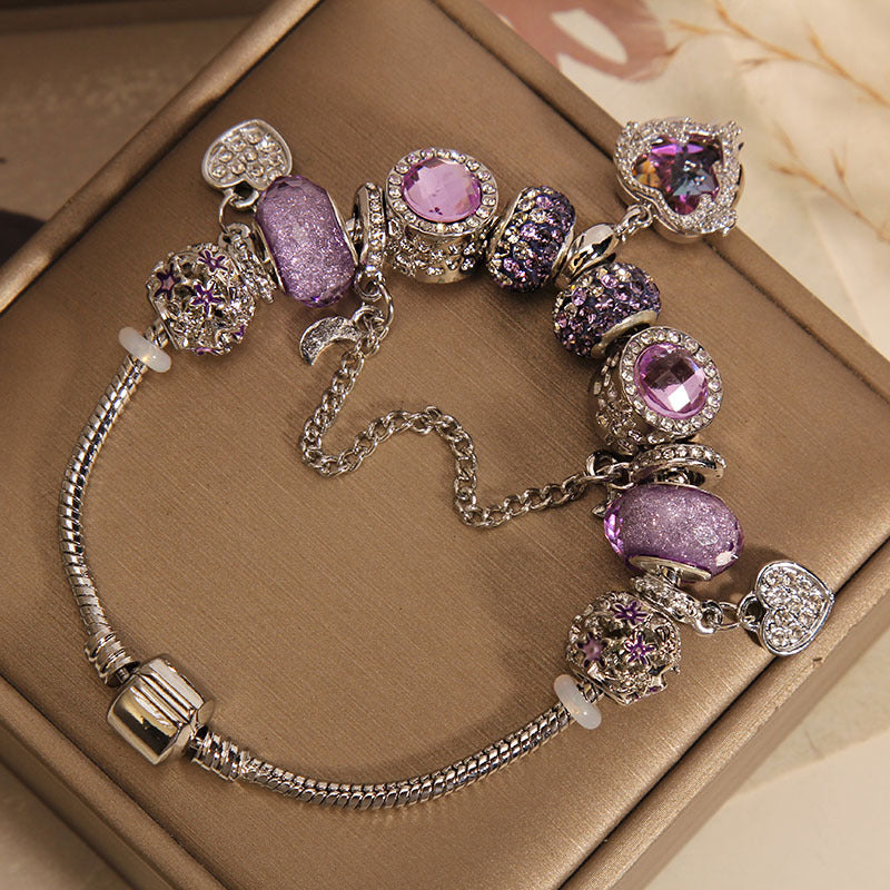 Pulsera Lujosa con Cuentas de Cristal Morado y Dije de Corazón