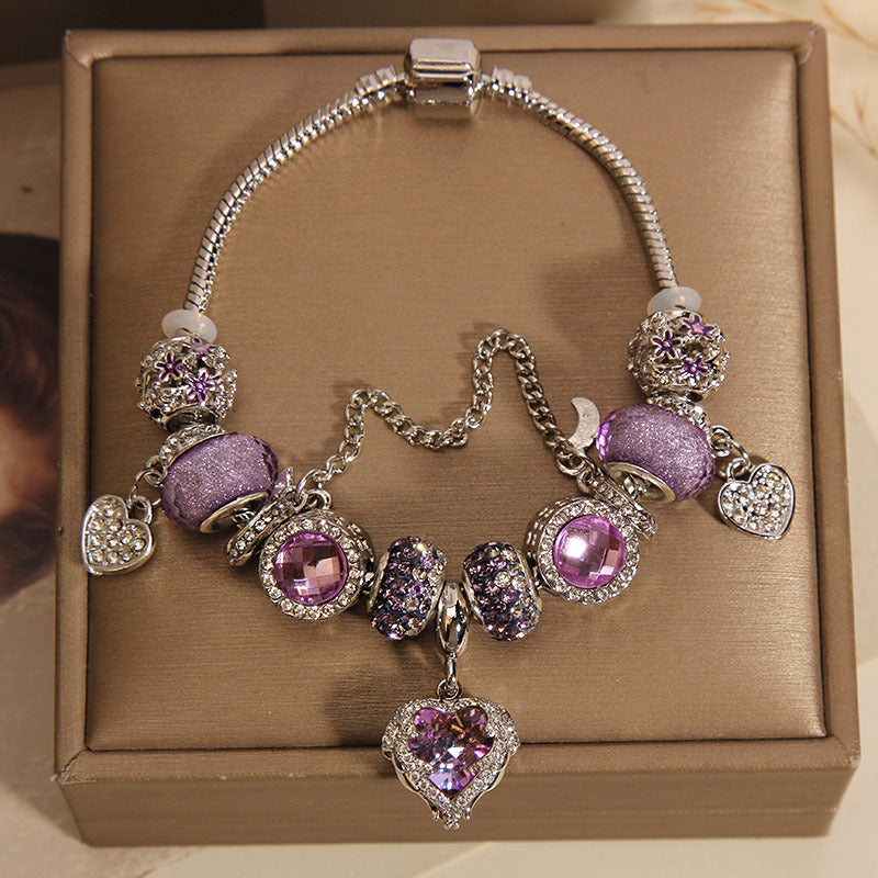 Pulsera Lujosa con Cuentas de Cristal Morado y Dije de Corazón