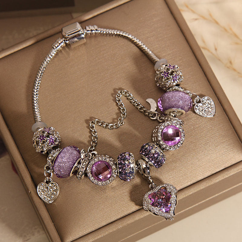 Pulsera Lujosa con Cuentas de Cristal Morado y Dije de Corazón