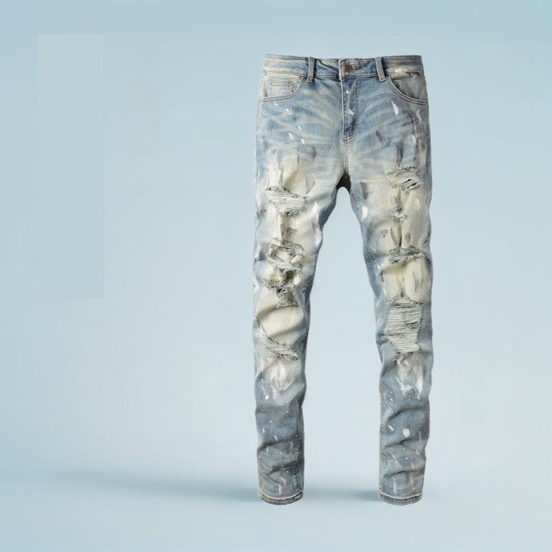Jeans vintage con agujeros y pintura para hombre