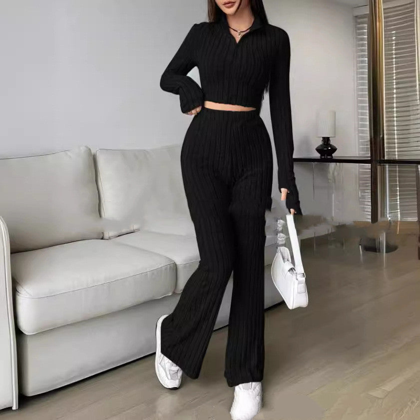 Conjunto de pantalones de talle alto y pierna ancha con suéter de punto de color sólido, manga larga y cuello alto.