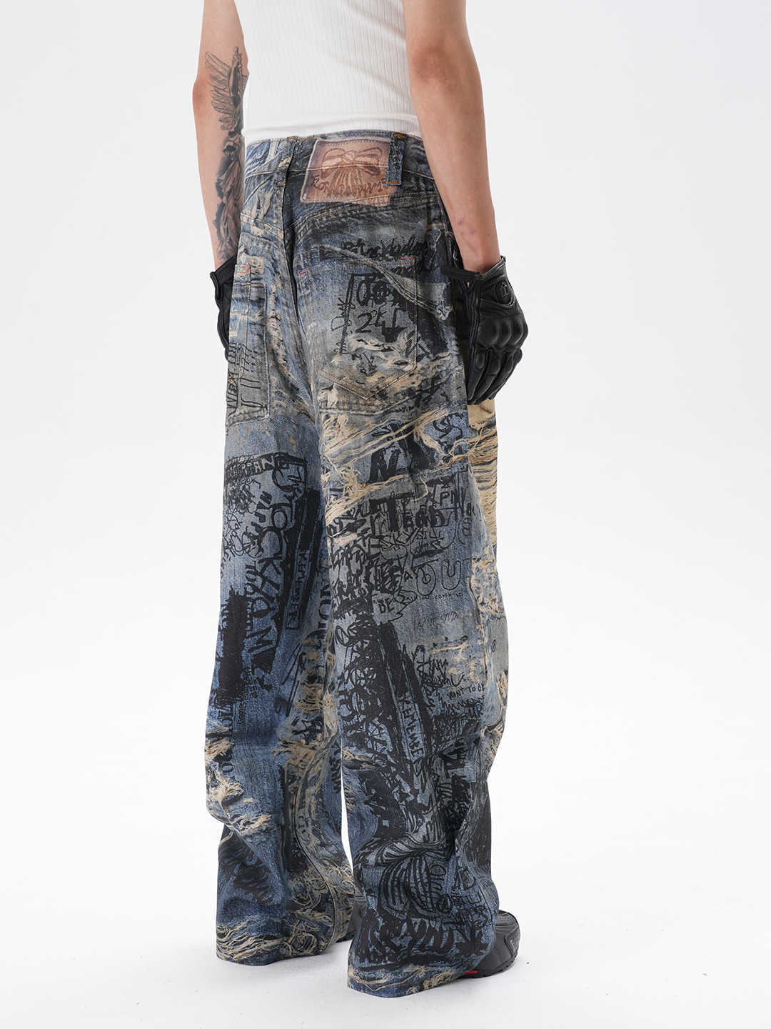 Jeans rectos rasgados con estampado graffiti 3D