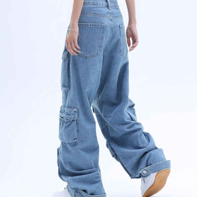 Jeans holgados estilo americano de calle alta con múltiples bolsillos y lavado desgastado.