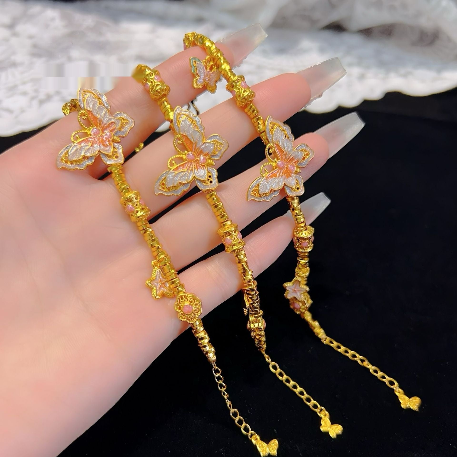 Pulsera con Colgante de Mariposa y Estrella en Oro Alluvial con Esmalte Morado